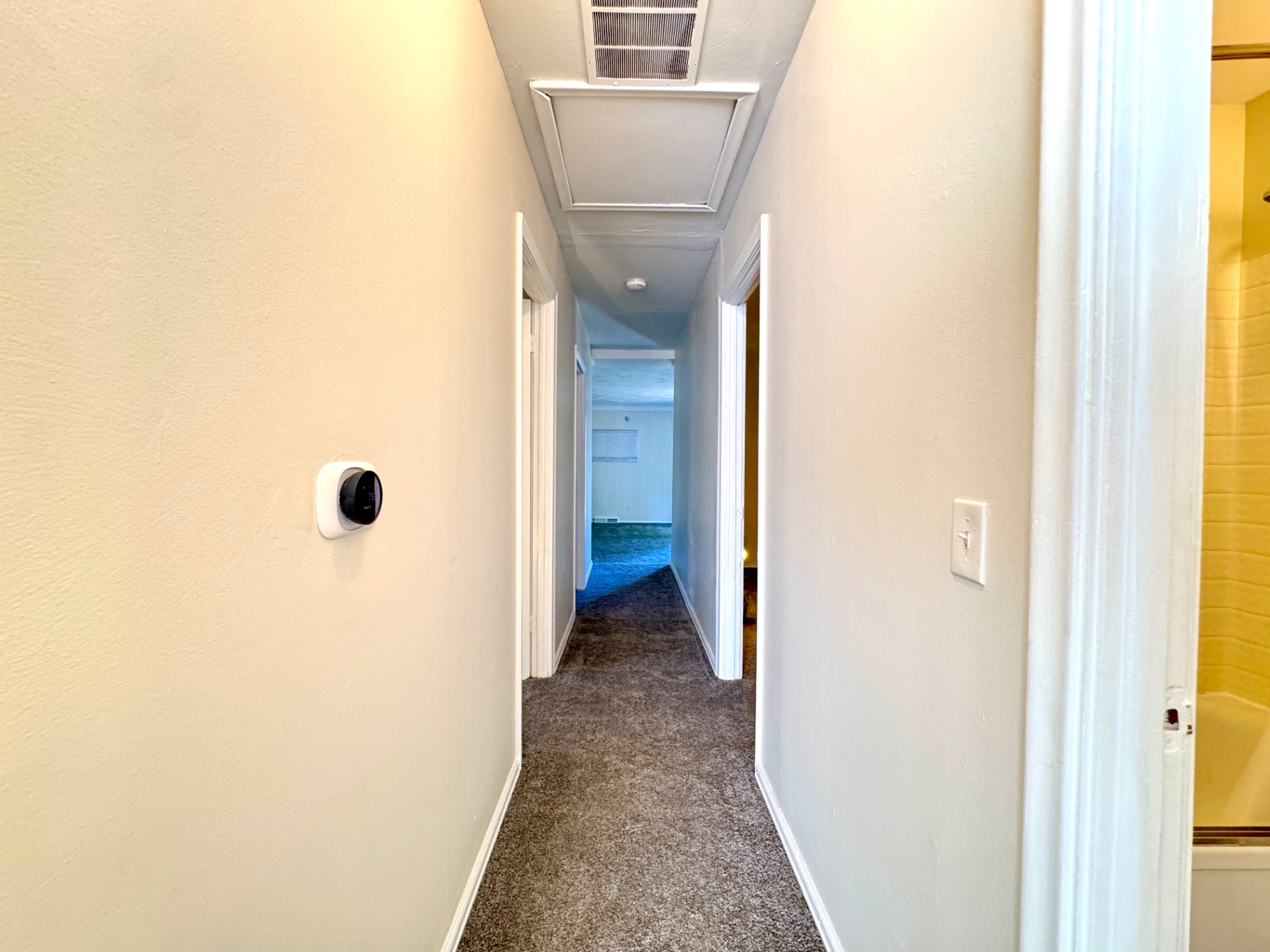 Main hallway connecting bedrooms and living areas