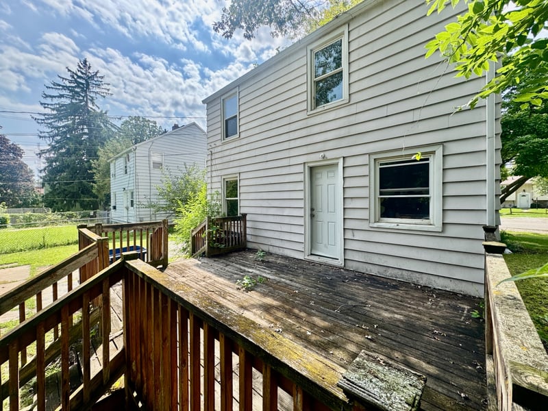 Wooden rear deck and back entrance at 510 Richards Road