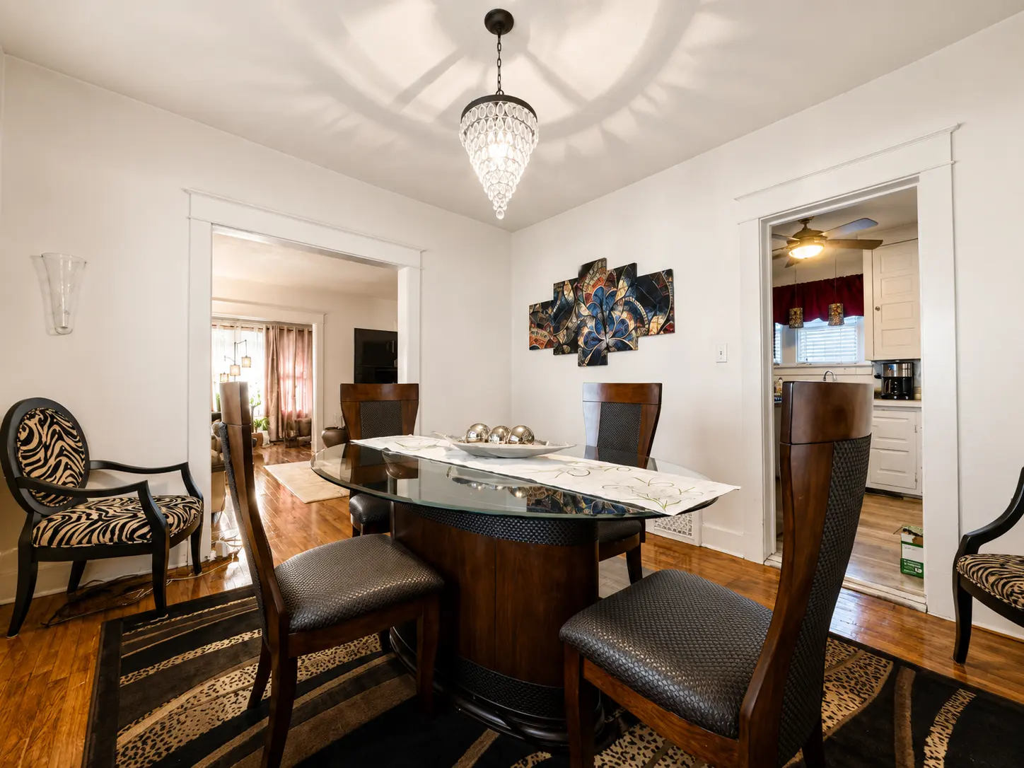 Dining room at 3718 Revere Drive looking through to the kitchen and living room doorways