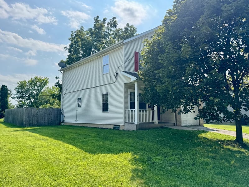 Rear-side exterior and yard at 737 Tecumseh Street