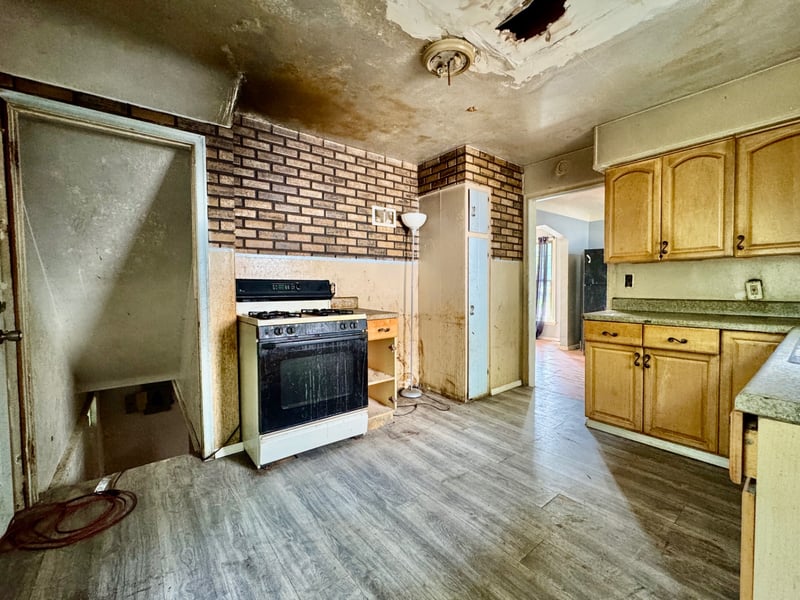 Kitchen at 510 Richards Road with gas range and wood cabinetry