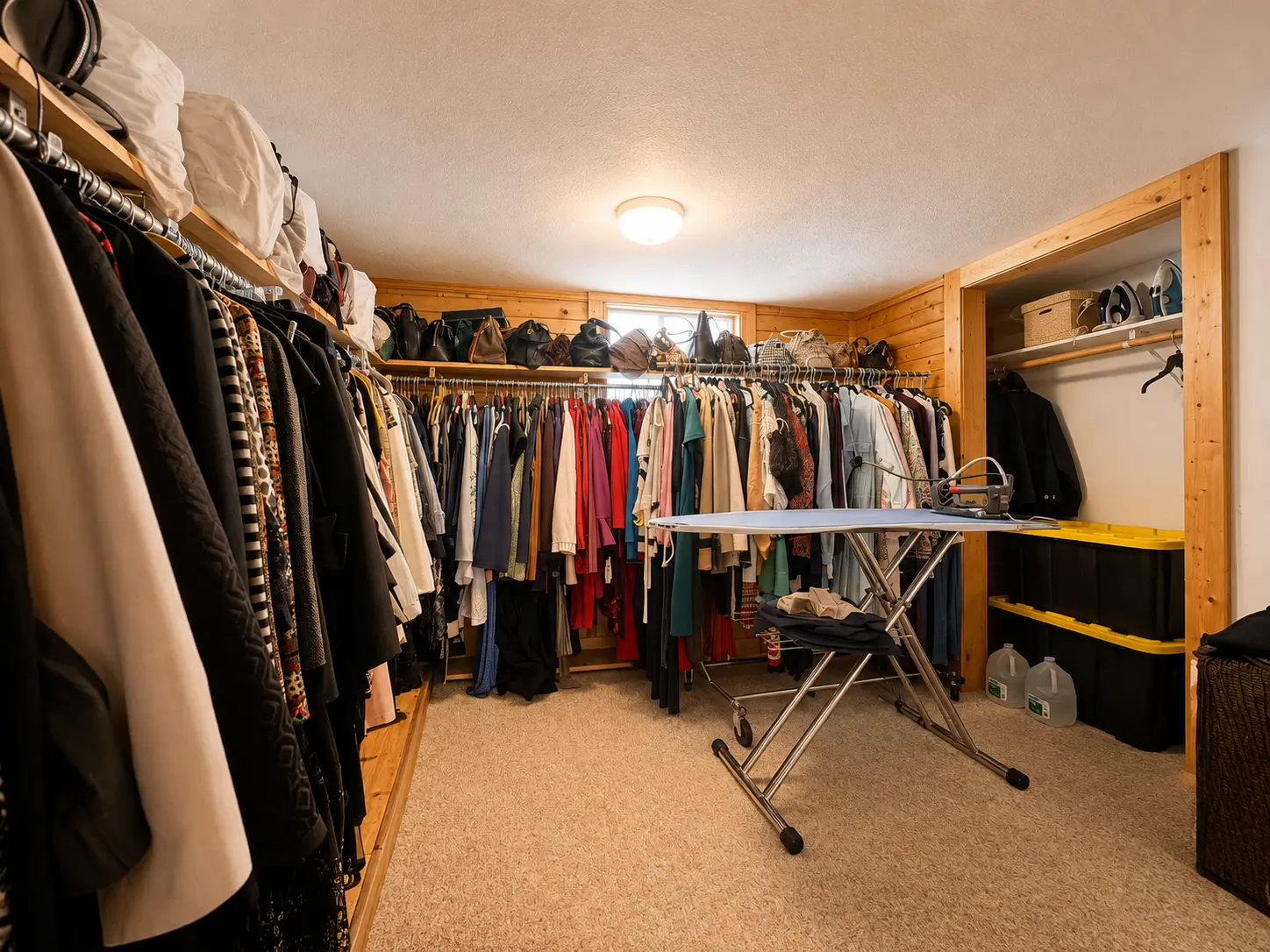 Large walk-in closet at 3718 Revere Drive with double hanging rods and shelving