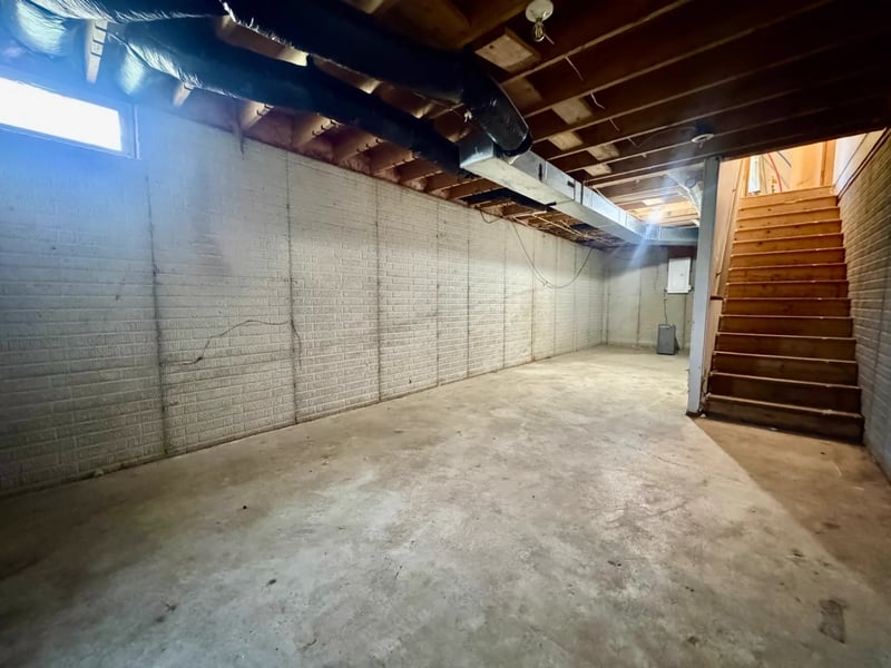 Partial basement with open storage area