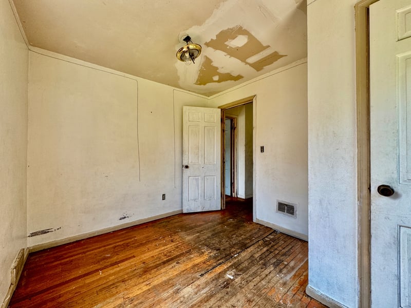 Bedroom at 510 Richards Road with hardwood floors