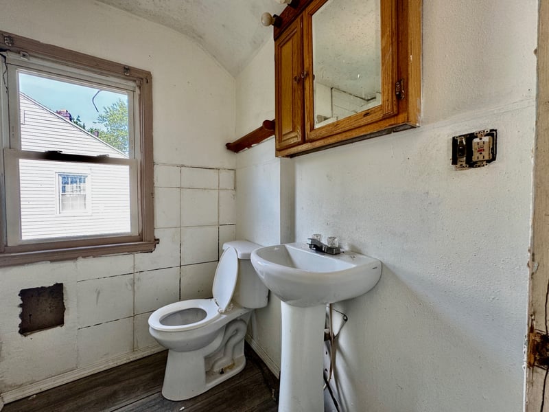 Full bathroom at 510 Richards Road with pedestal sink