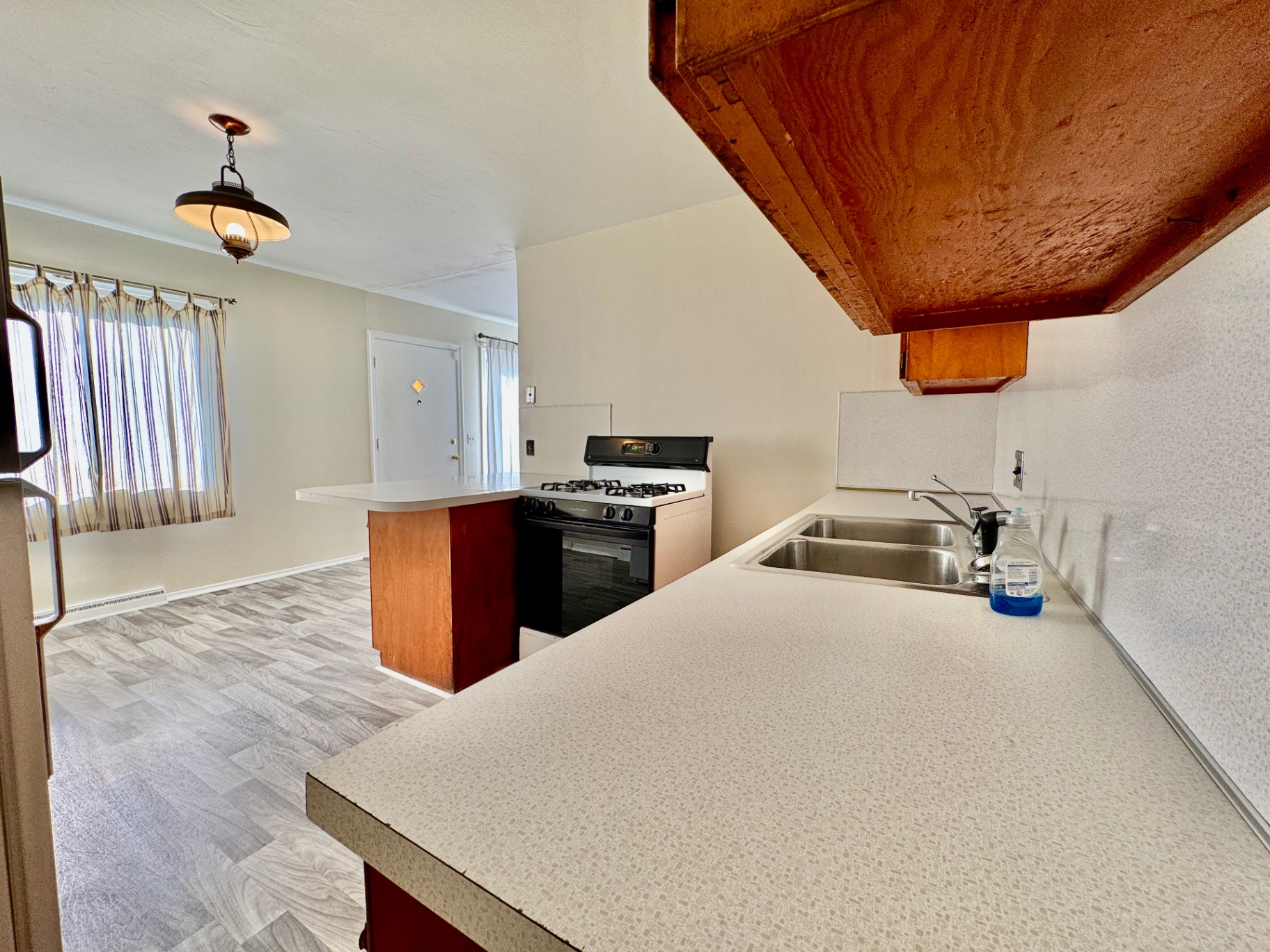 Laundry and utility room with furnace and water heater
