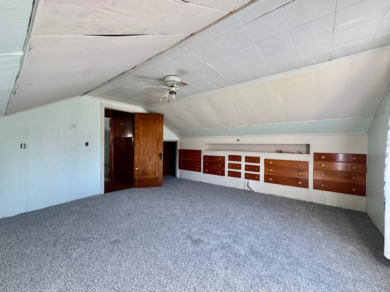 Upper-level room with built-in storage