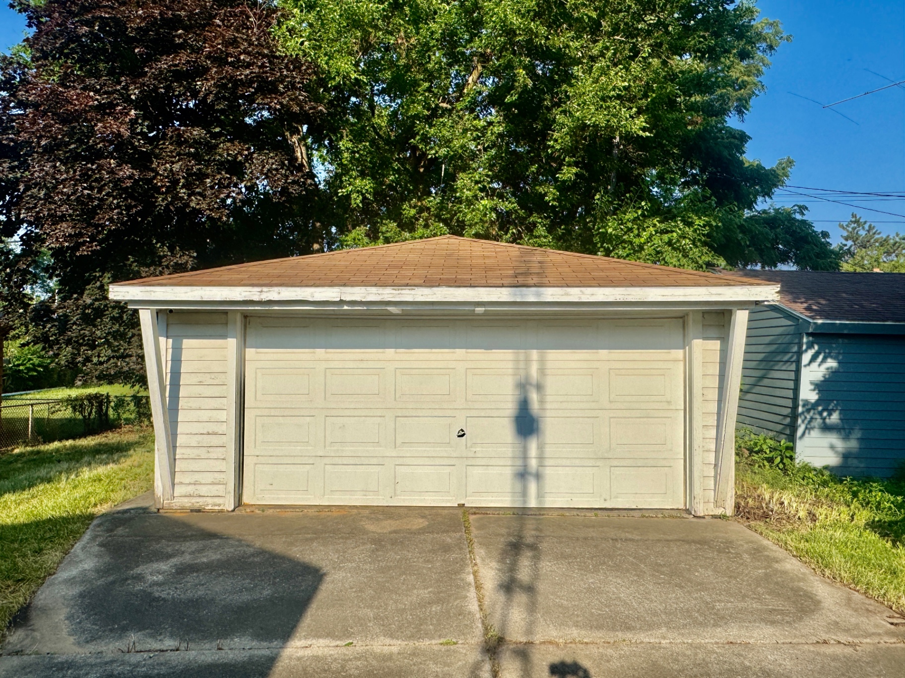 Detached two-car garage with doors closed